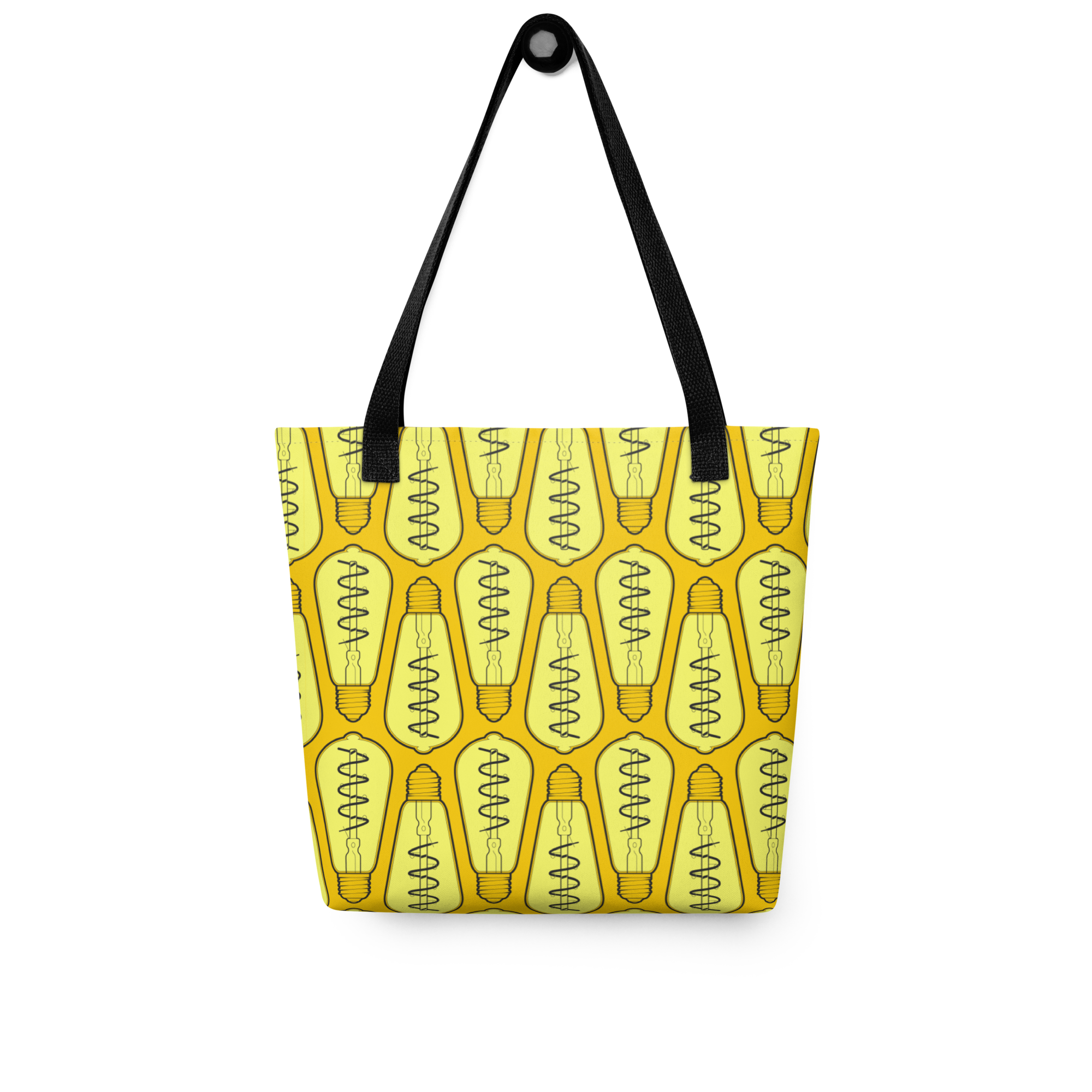 Bolsa tote colgada, vista posterior, mostrando el patrón repetitivo de bombillas isométricas en tonos claros.