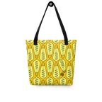 Bolsa tote colgada, vista frontal, con patrón isométrico de bombillas encendidas en alto contraste y un foco distinto integrado en el diseño.