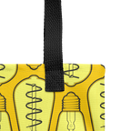 Detalle de las asas de la bolsa tote mostrando costuras reforzadas, textura de la cinta y acabados.